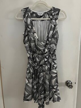 bebe Y2K Black & White Geometric Surplice Tie-Waist Mini Dress
